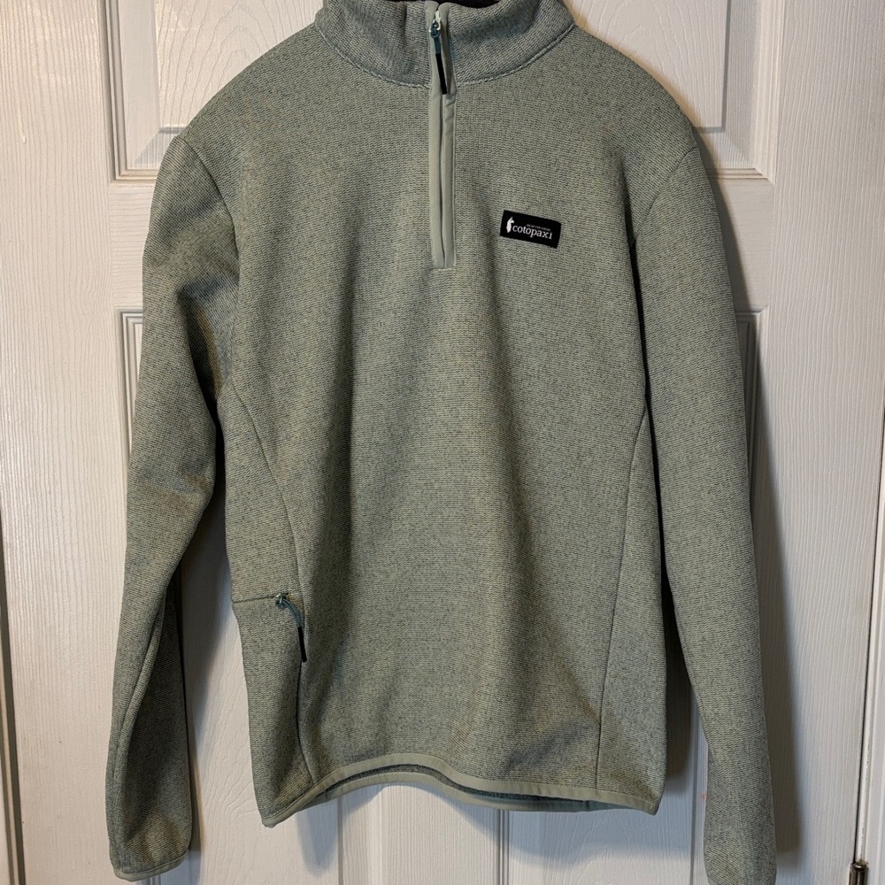 NWOT. Cotopaxi Women’ Envo Zip-Up quarter-zip pullover in light green.